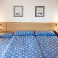 Triple Room (2 Adults + 1 Child)