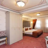 Deluxe Quadruple Room with Balcony