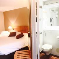 Triple Room (1 Double Bed + 1 Single Bed)