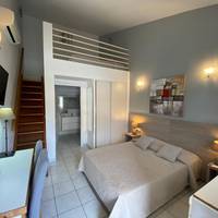 Quadruple Room (2 Adults + 2 Children under 12 Years)