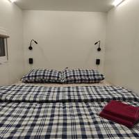 Small Double Capsule Room with Window and TV-set