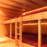 Bed in 8-Bed Dormitory Room with Shared Bathroom
