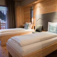 Room with large bed and balcony
