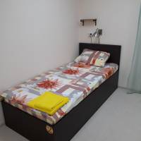 Single Bed in Dormitory Room