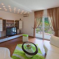 Three-Bedroom Apartment with Terrace and Sea View