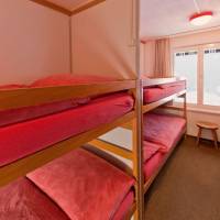 Single Bed in Dormitory Room