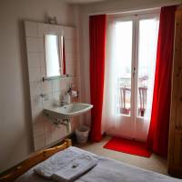 Queen Bed Room with Shared Bathroom