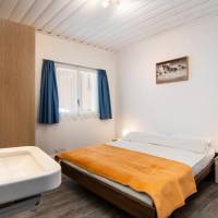 Queen Room with Shared Bathroom