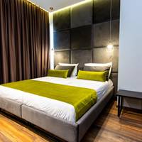 Deluxe Quadruple Room with Balcony