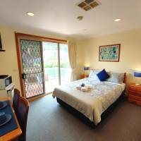 Queen Room with Shared Bathroom