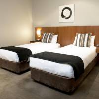 Two-Bedroom Suite with One Queen and Two Single Beds