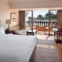 Deluxe Garden View Room, Guest room, 1 King, Garden view, Balcony