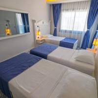 Triple Room with balcony and side Sea View