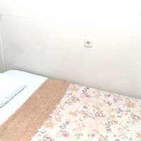Single Bed in Female Dormitory Room