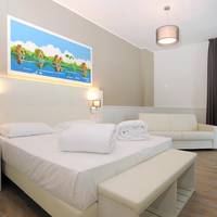 Deluxe Quadruple Room with Side Sea View