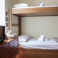 Bed in 6-Bed Dormitory Room with Shared Bathroom