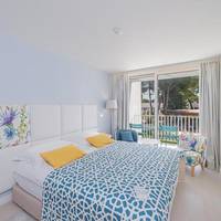 Family Room with Balcony and Courtyard View