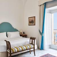 Queen Room with Balcony and Partial Sea View