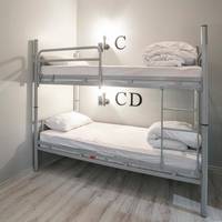 Single Bed in Dormitory Room