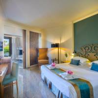 Family Junior Suite Garden View with Patio (2 Adults + 2 Children)