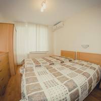 One-Bedroom Apartment with Balcony (2 Adults + 2 Children)