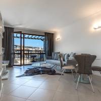 Deluxe One-Bedroom Suite with Partial Sea View (2 Adults + 1 Child)