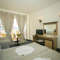 Double Room with Side Sea View (2 Adults + 1 Child up to 11 Years Old)